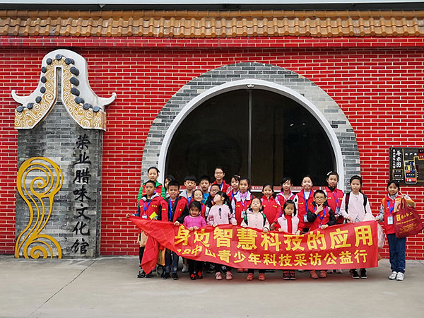 中山日報(bào)小記者到榮業(yè)臘味文化館體驗(yàn)老手藝，感悟舊時(shí)光